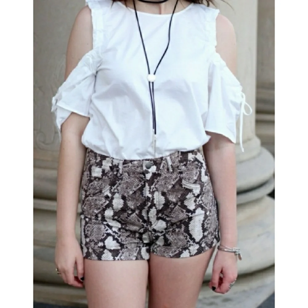H&M snake print DENIM shorts size 10